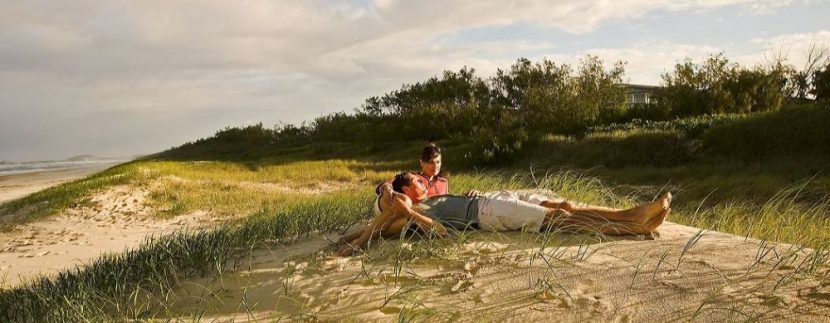 Couple lazing on beach